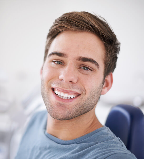 Man smiling with straight teeth